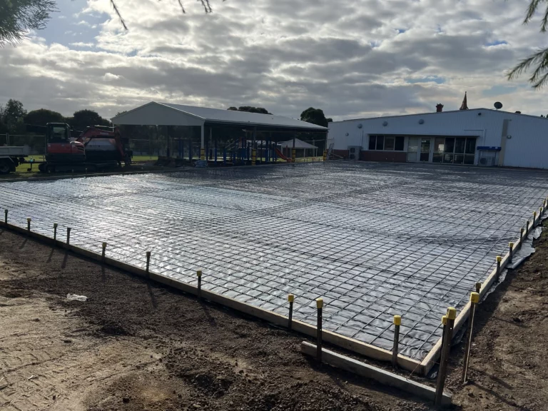 Image showing reinforced mesh installed on the sports court base before concrete is poured.